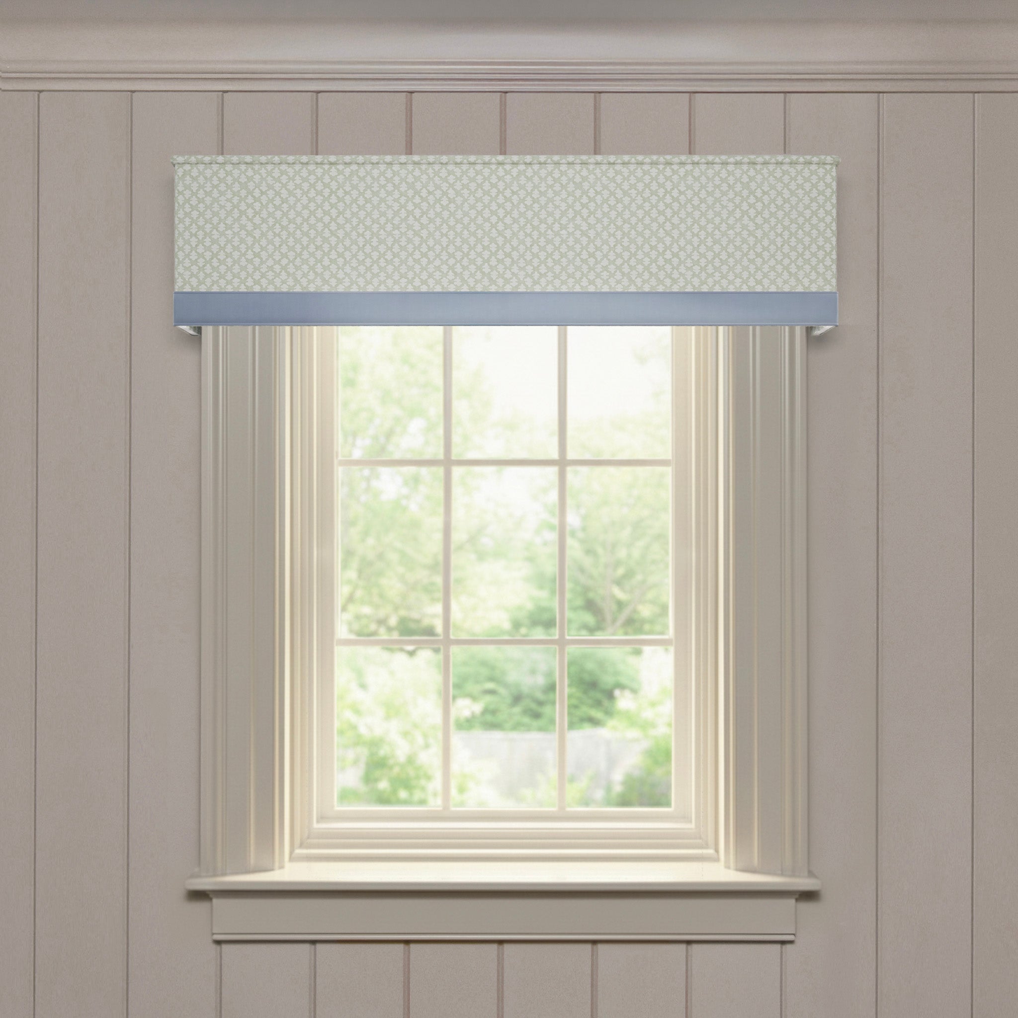 Quinn Eucalyptus valance in soft printed cotton with geometric pattern and solid trim over bright window in neutral room