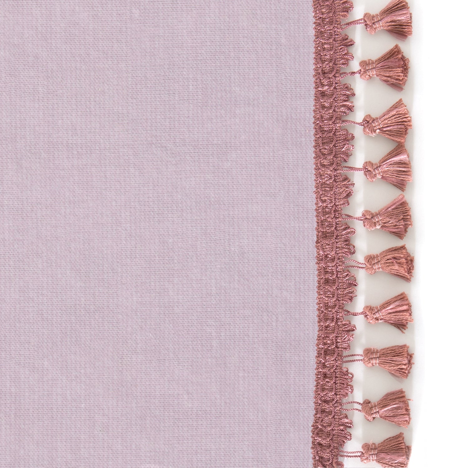 Upclose picture of Lilac Velvet custom curtain with dusty rose tassel trim