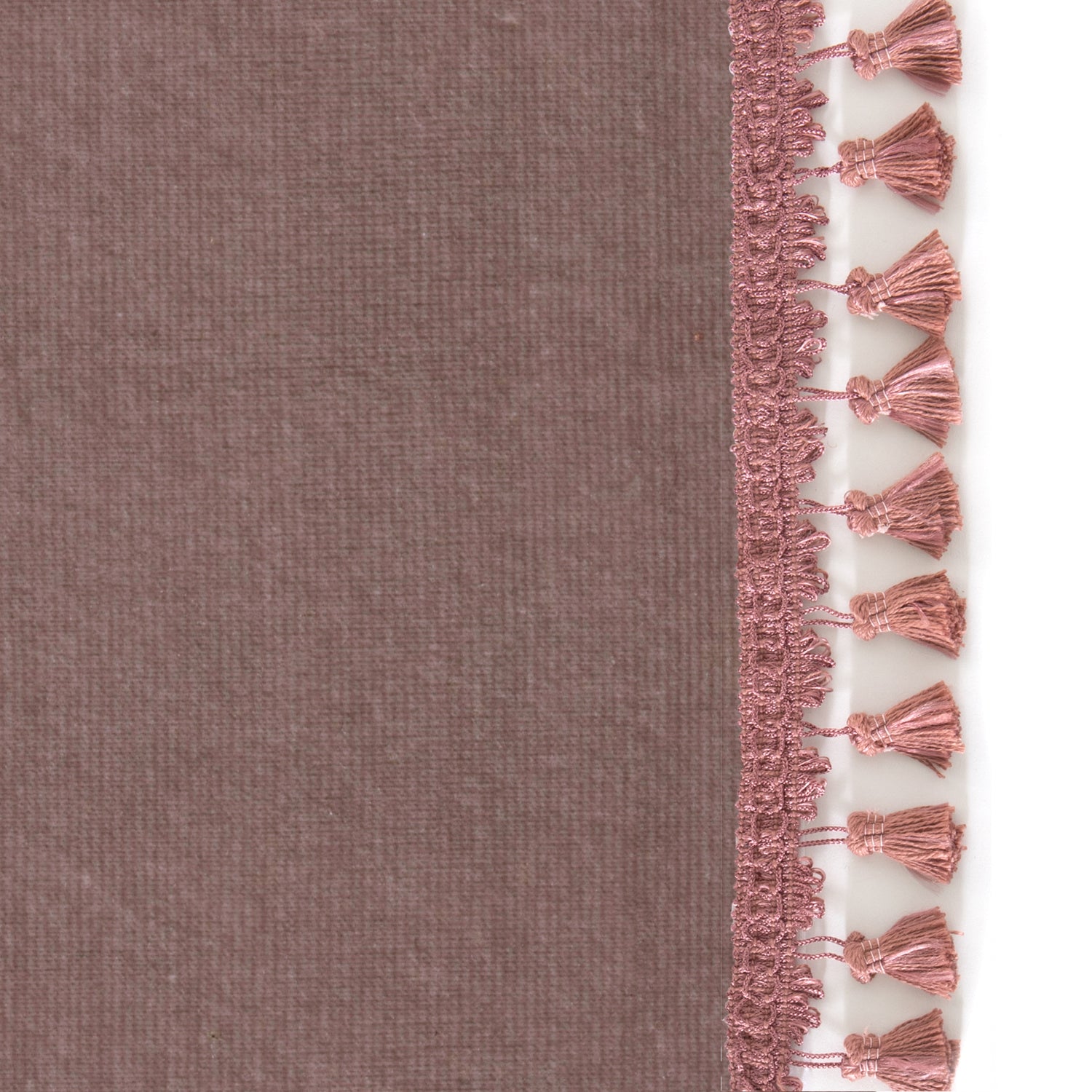 Upclose picture of Mauve Velvet custom curtain with dusty rose tassel trim