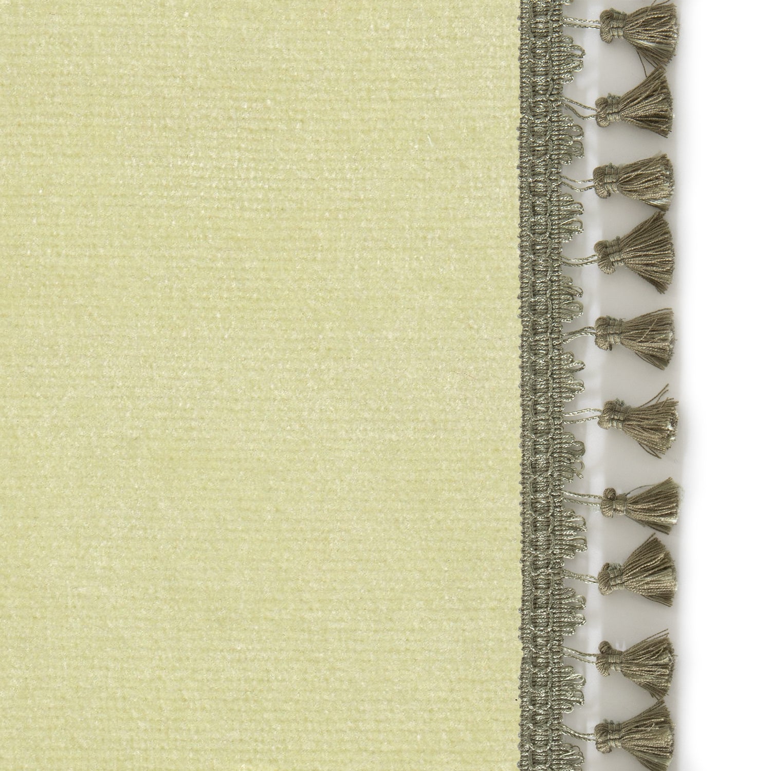 Upclose picture of Pear Velvet custom curtain with sage tassel trim