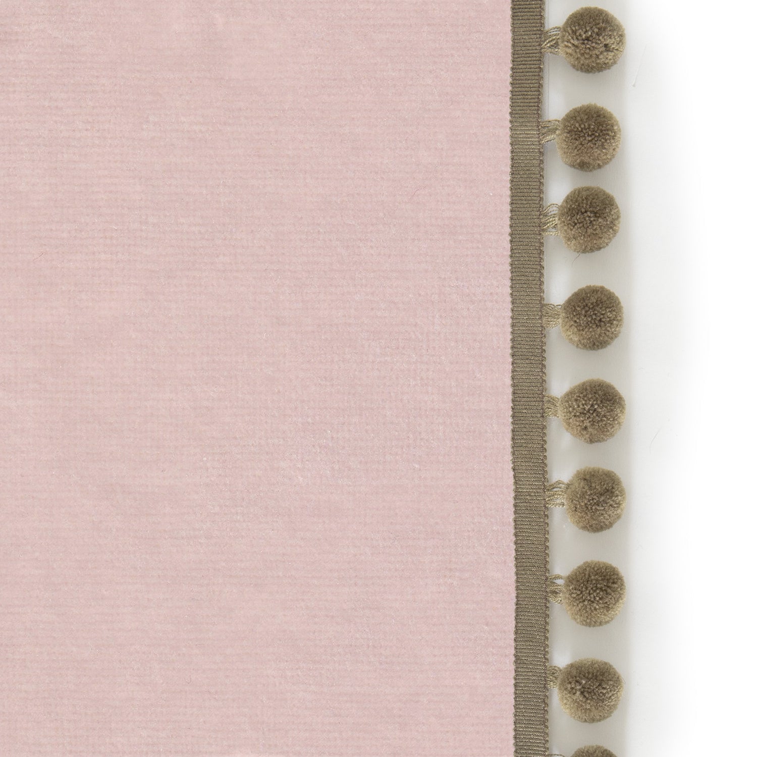 Upclose picture of Rose Velvet custom curtain with olive pom pom trim