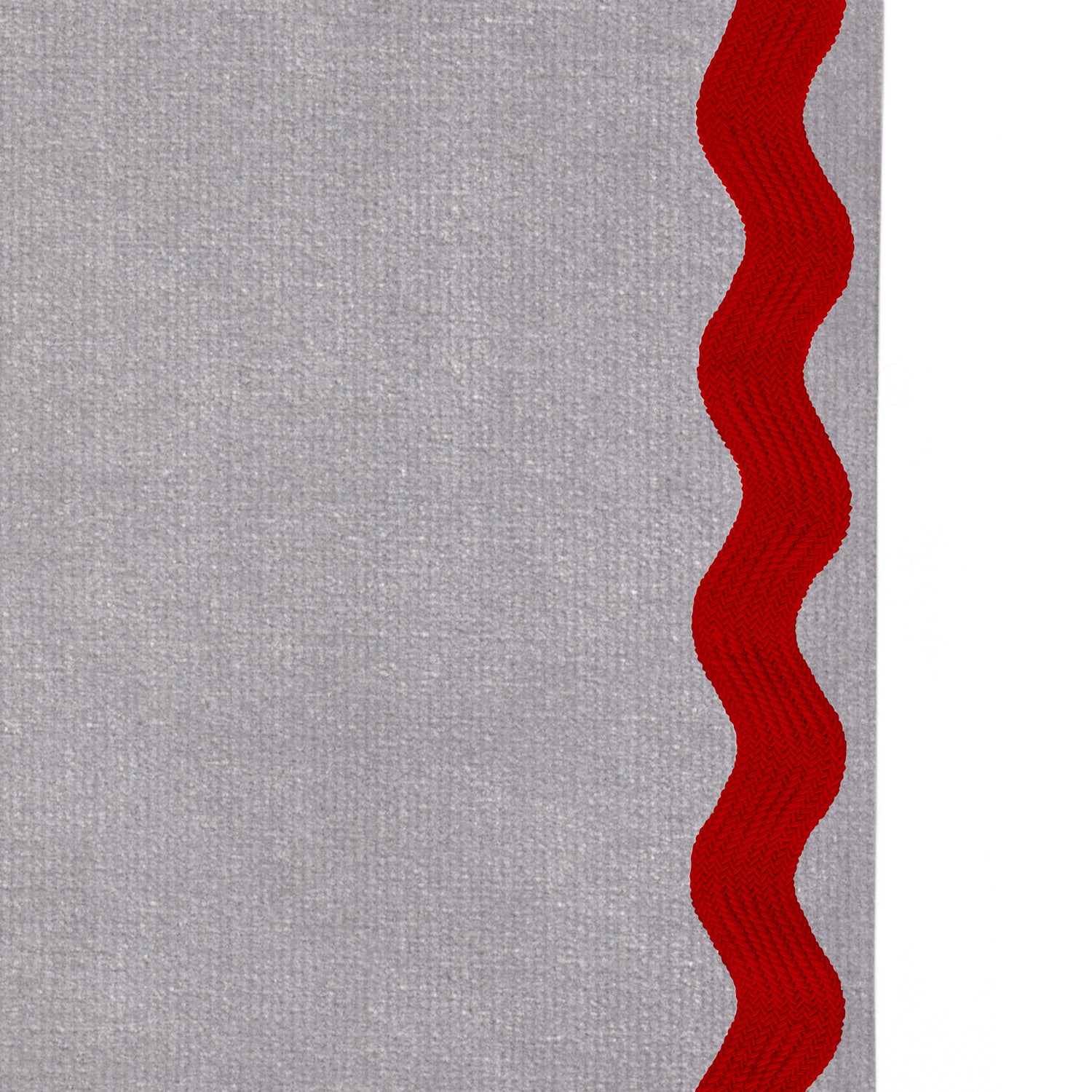 Upclose picture of Steel Velvet custom curtain with cherry rick rack trim