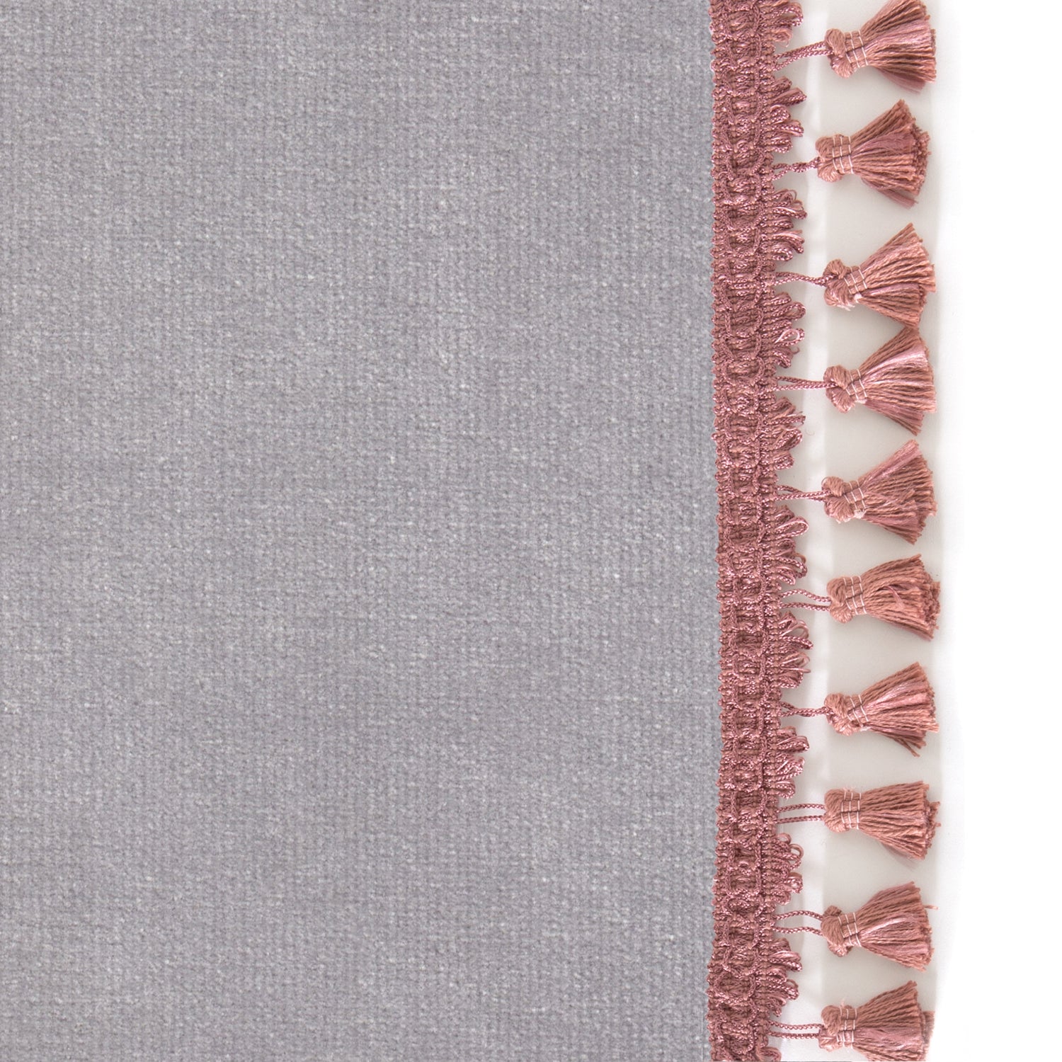 Upclose picture of Steel Velvet custom curtain with dusty rose tassel trim