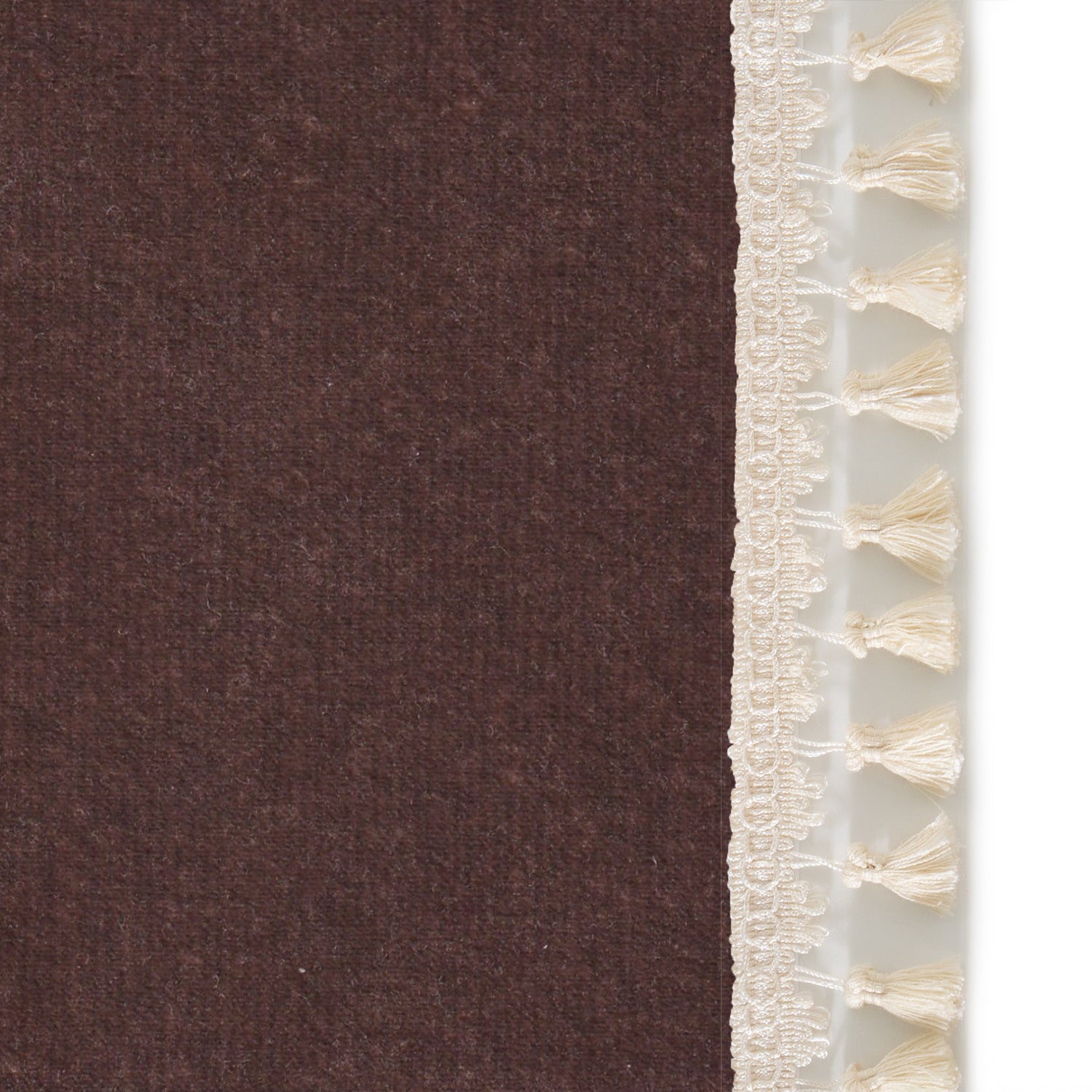 Upclose picture of Walnut Velvet custom Browncurtain with cream tassel trim