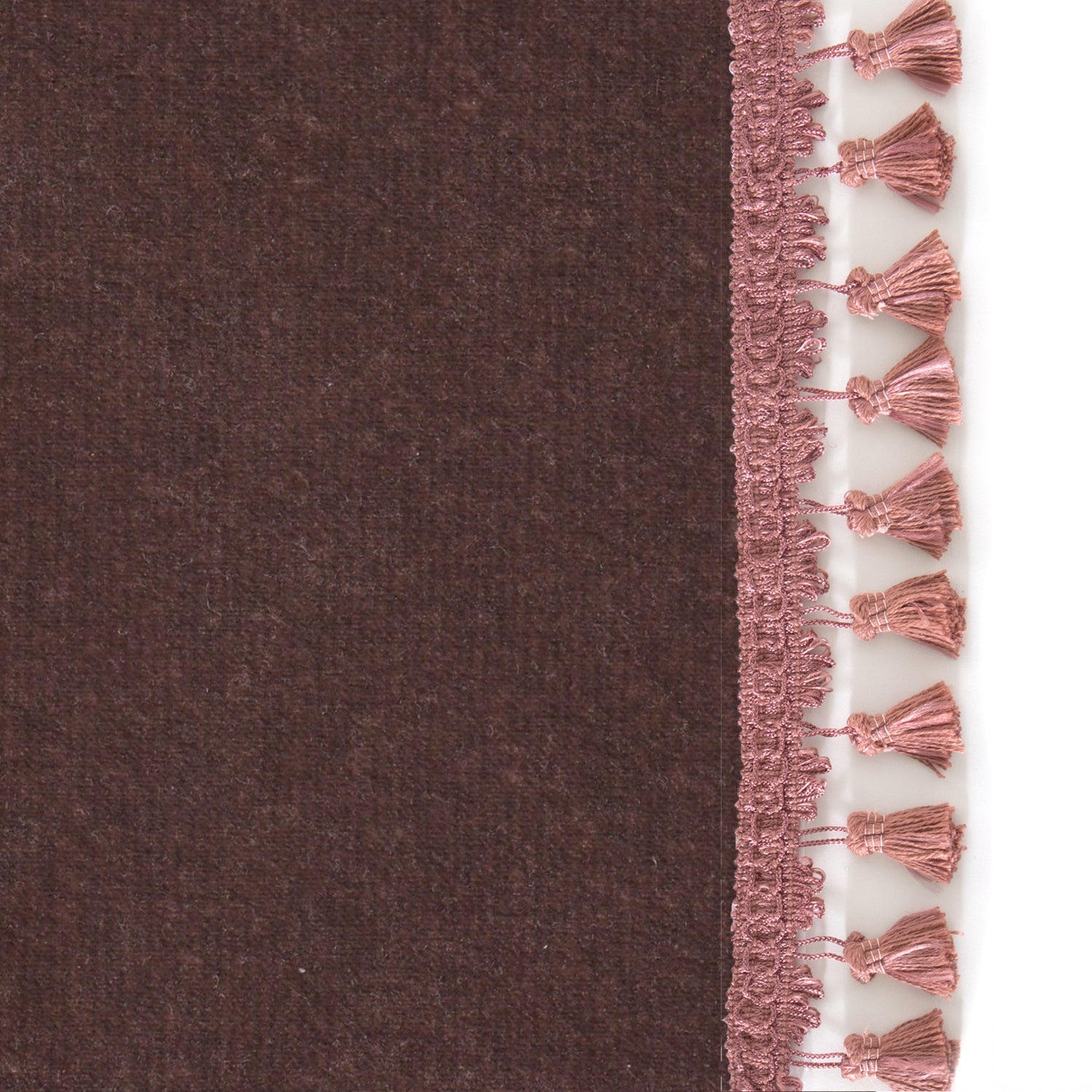 Upclose picture of Walnut Velvet custom curtain with dusty rose tassel trim