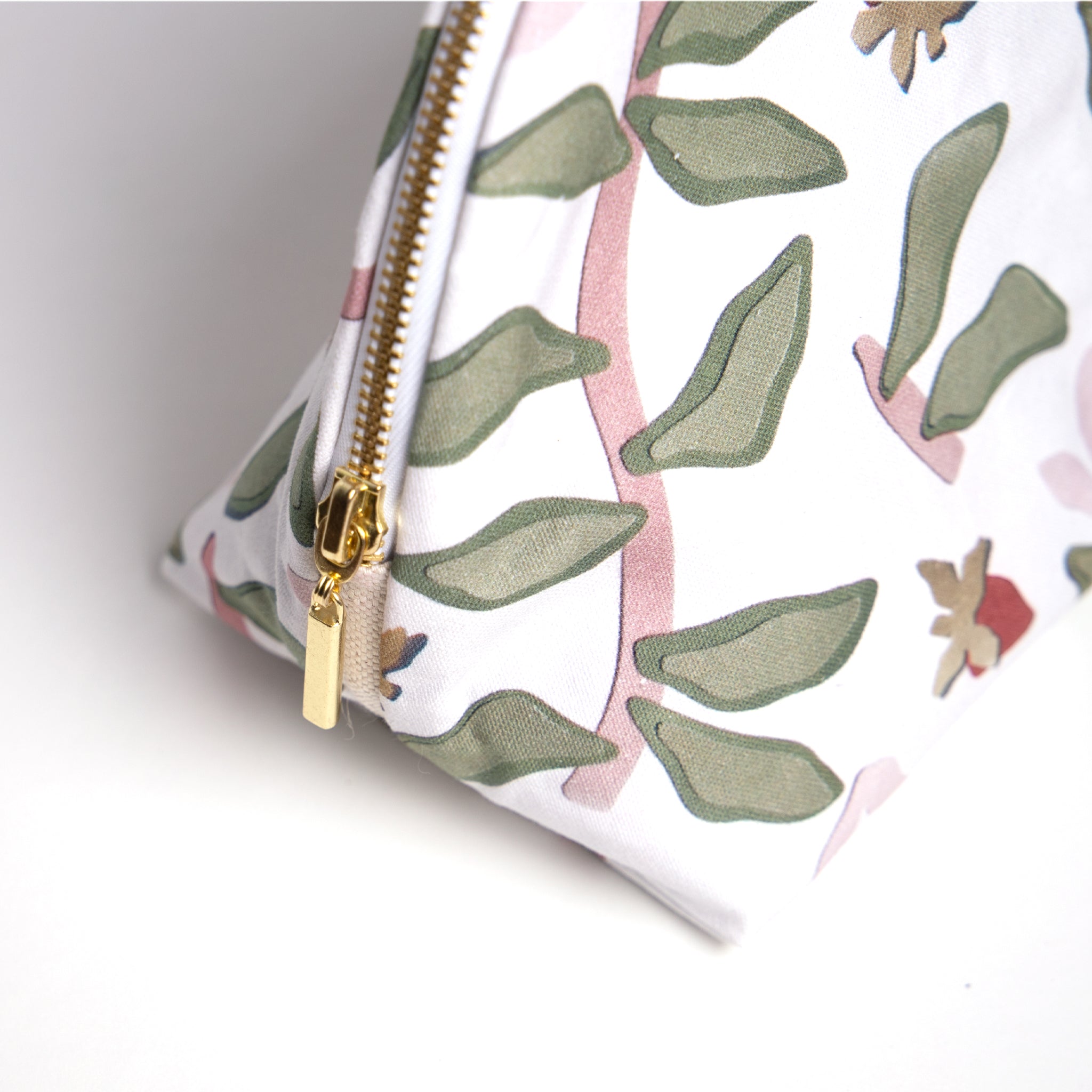 Close-up of Gold Zipper on Strawberry & Botanical Printed Monogrammed Pouch