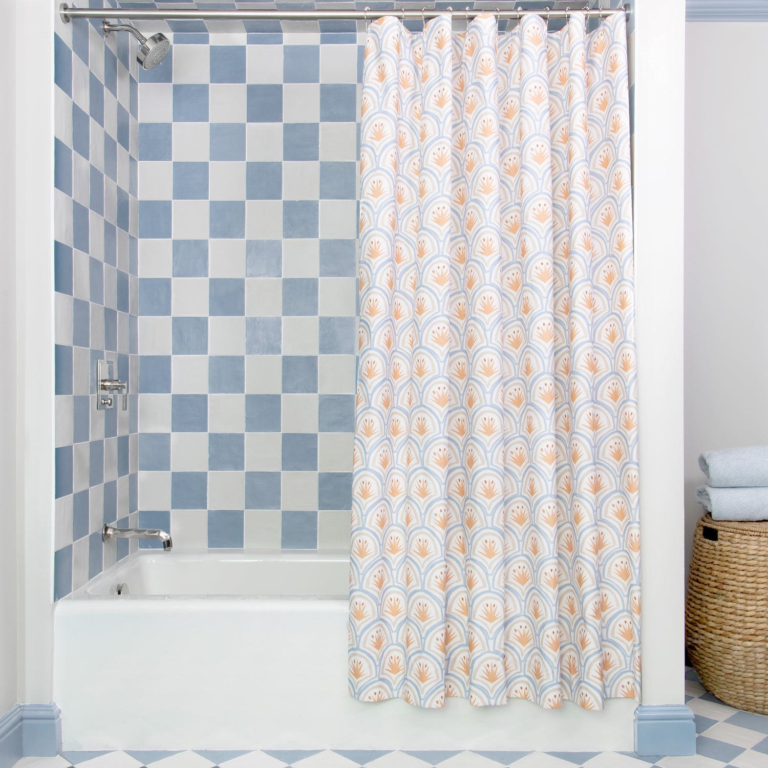 Art Deco Palm Pattern Printed Shower Curtain hanging on rod in front of white tub in bathroom with blue and white tiles