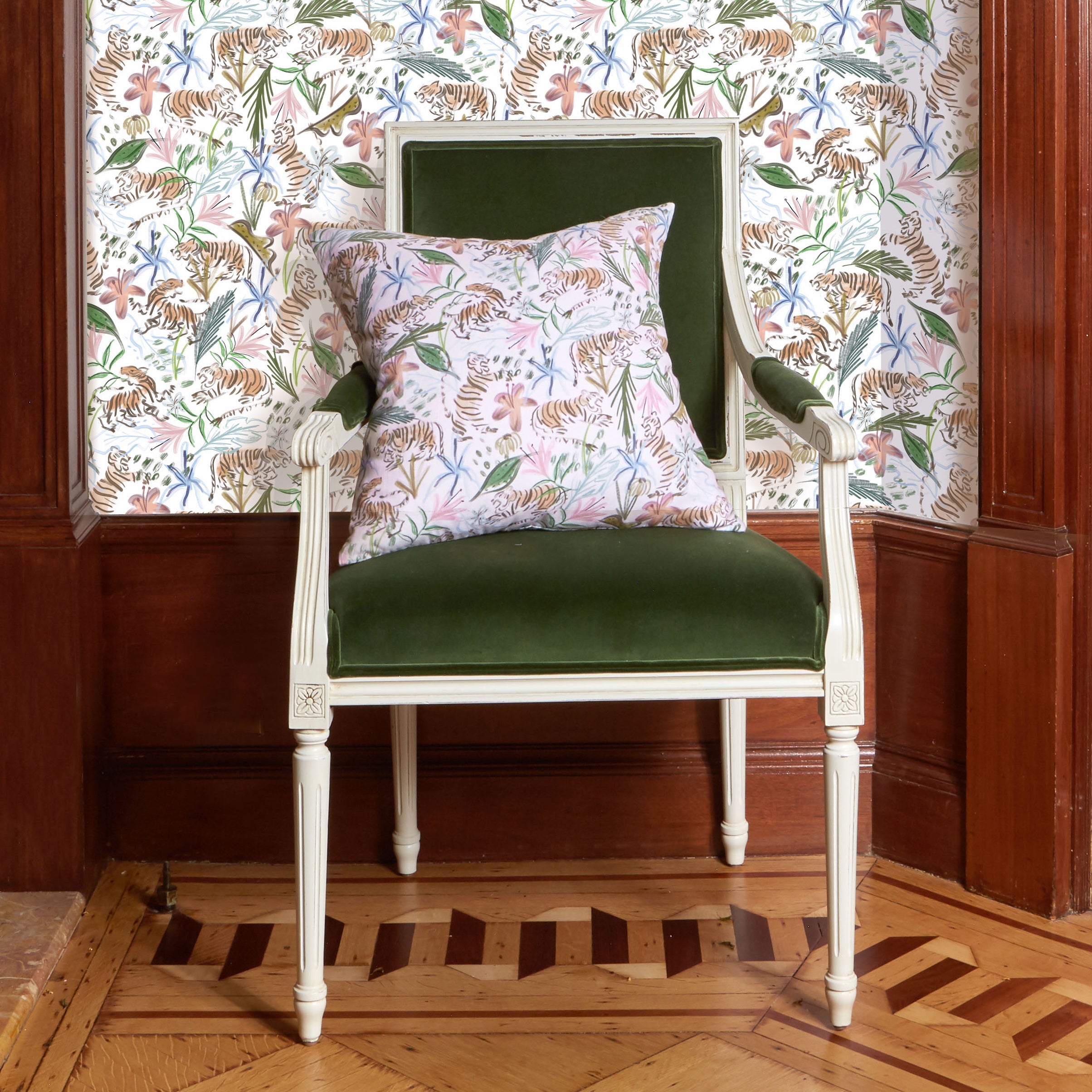 Corner Close-Up with Pink Chinoiserie Tiger Printed Wallpaper with Pink Chinoiserie Tiger Printed Pillow on Fern Green Velvet Chair in the front