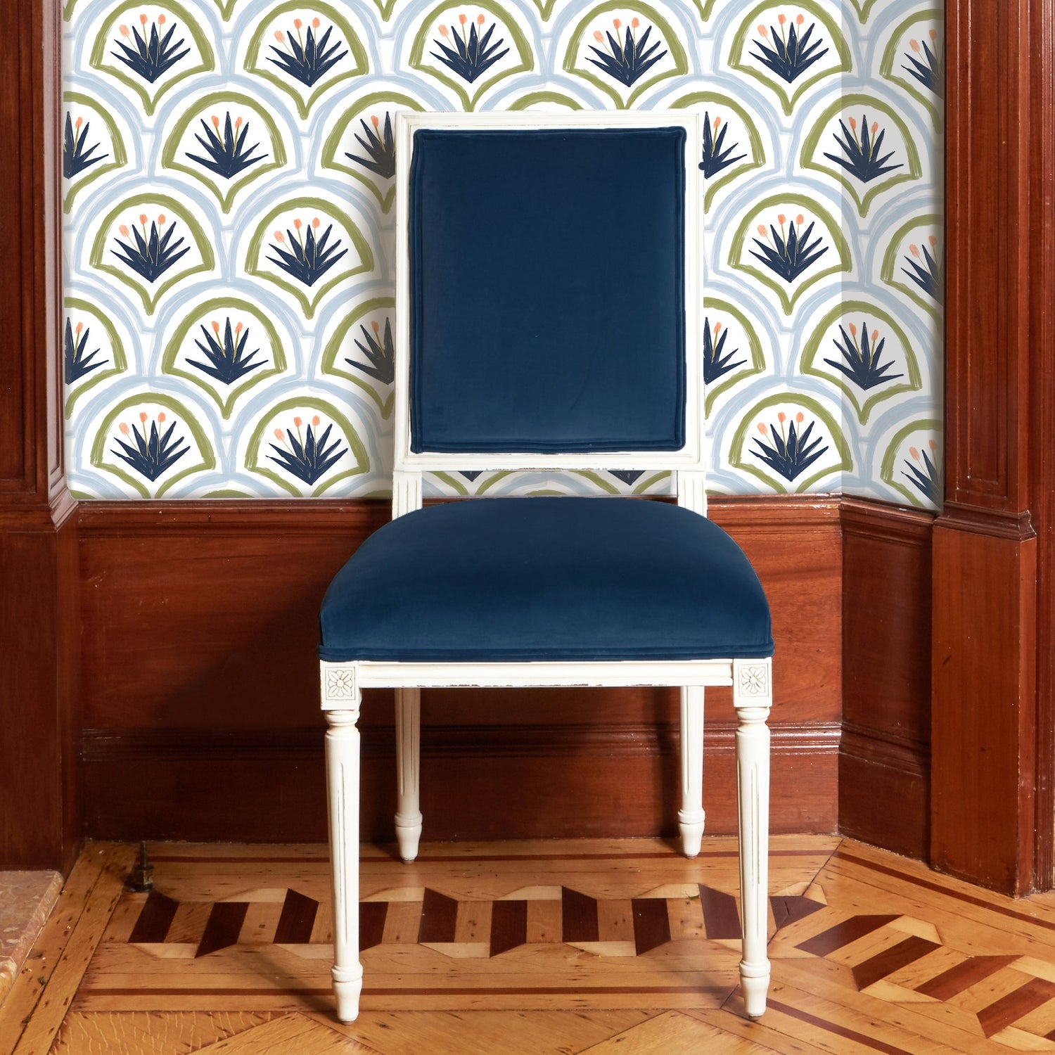 Navy Blue Velvet Chair Close-up styled with Art Deco Palm Pattern Printed Wallpaper
